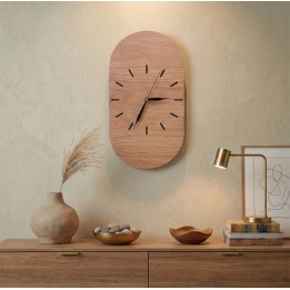 Oval clock made of oak plywood