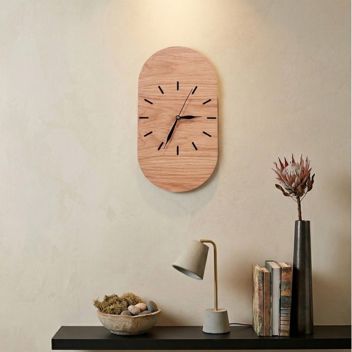 Oval clock made of oak plywood